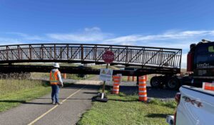 Ruminations on the weight of a neighbourhood bridge.